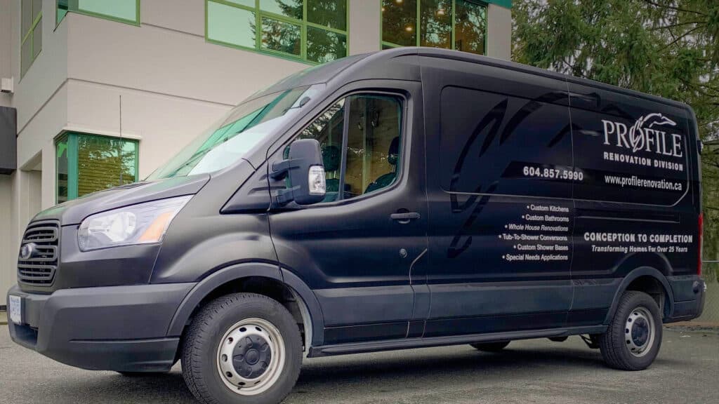 Profile Renovation work truck parked outside, featuring branding and contact information, emphasizing kitchen and bathroom renovation services in Coquitlam.